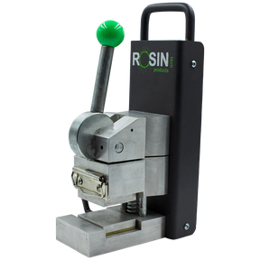 Rosin Tech Go™ compact press in black and silver for dry herbs, plug-in power, side view