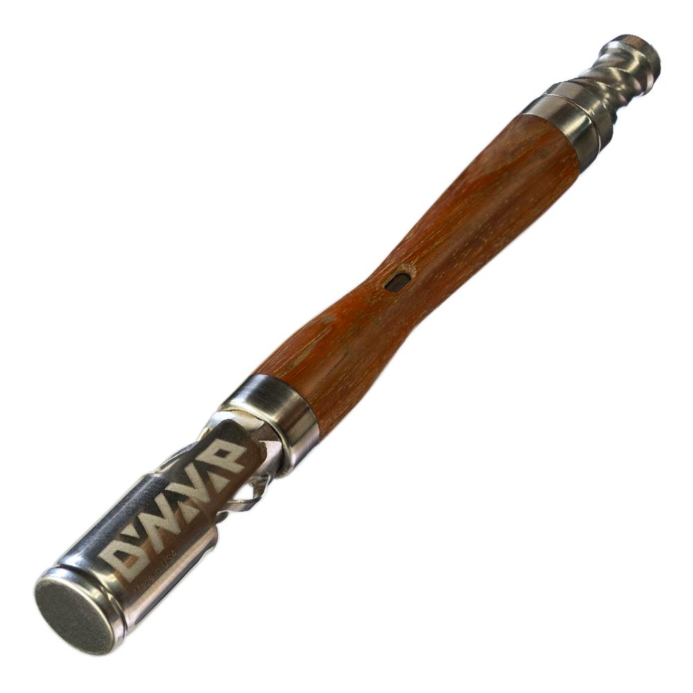 DynaVap WoodWynd Ipe photographed in a horizontal studio layout, showing the wood stem alongside the titanium cap.