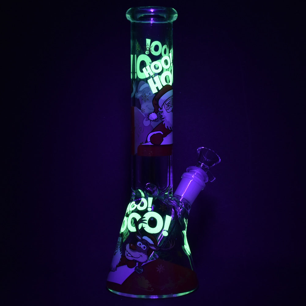 Glow in the dark Santa Claus themed 10" glass beaker water pipe with 14mm female joint, front view.