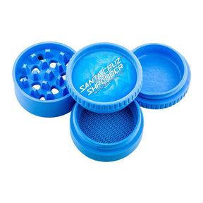 Assorted colors Santa Cruz Shredder Hemp 4 Piece Grinders with SCS logo, top view