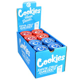 Santa Cruz Shredder x Cookies Hemp Grinders in display box, blue and red, compact and portable