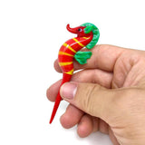 DankGeek Seahorse Dabber in hand, red with yellow stripes, borosilicate glass, front view