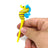 Hand holding DankGeek Seahorse Dabber in yellow, made with borosilicate glass, ideal for dab rigs
