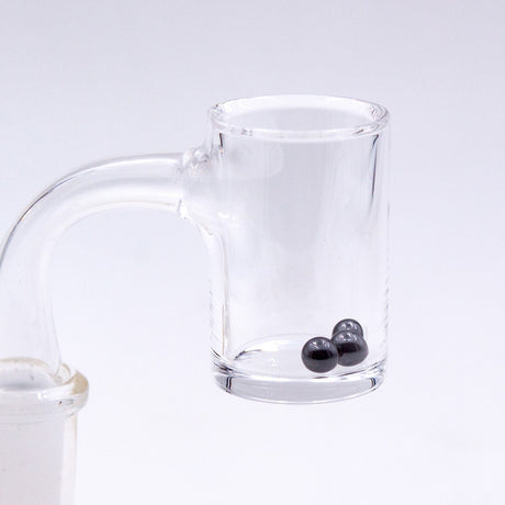 Silicon Carbide Terp Pearls by The Stash Shack inside a clear glass dab rig attachment