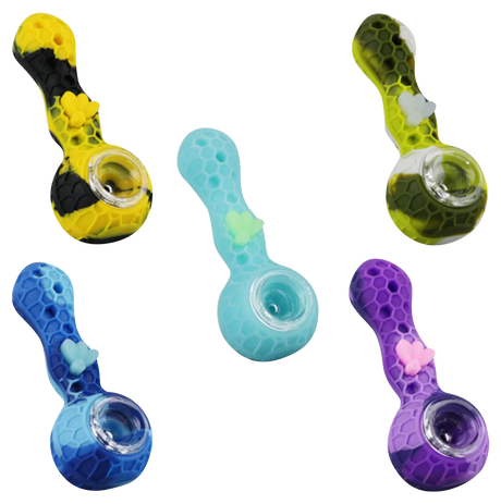 Assorted Silicone Bee Hand Pipes with Borosilicate Glass Bowls on Striped Background