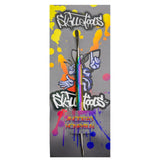 Skilletools Anodized Titanium Dab Tool with Rainbow Finish on Graffiti Background