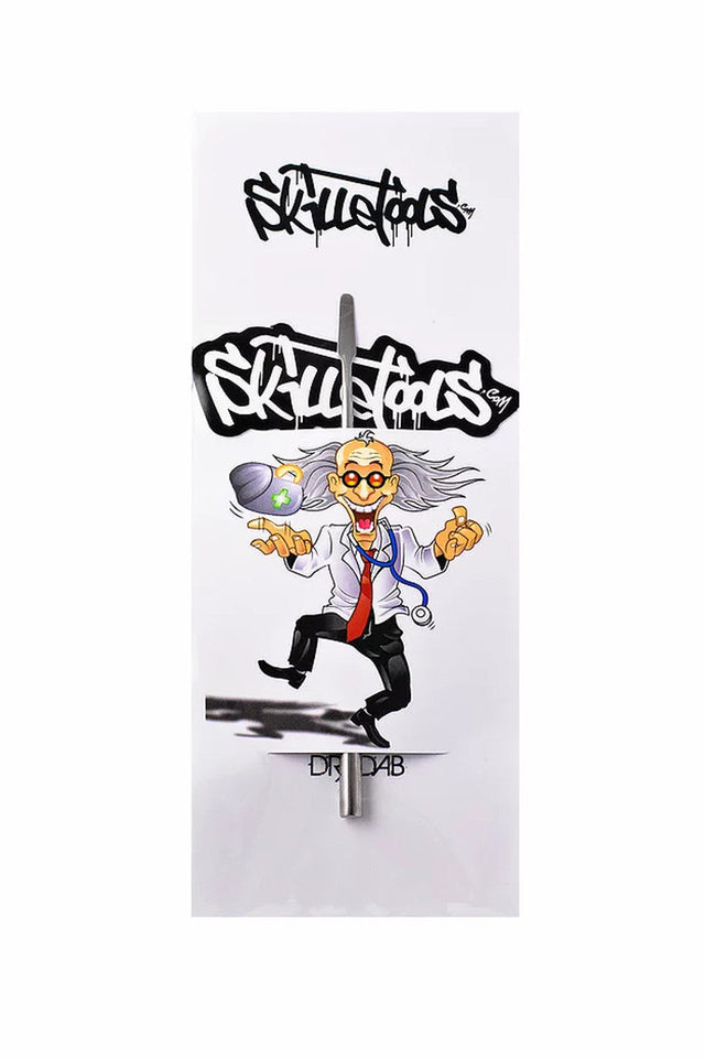 Skilletools Doctor Dab steel dab tool with cartoon character design, front view on white background