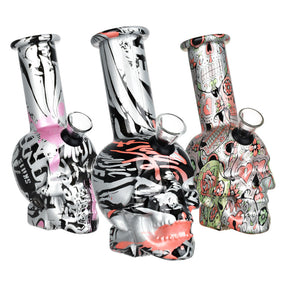 Assortment of Skull Printed Glass Mini Water Pipes with Borosilicate Glass, 5.75" tall, angled view