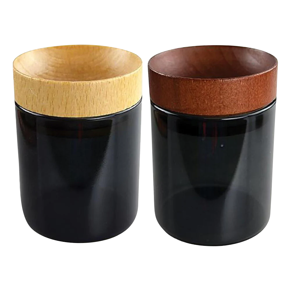 Smokezilla black glass jars with concave wood lids in a 6 pack, ideal for dry herbs storage