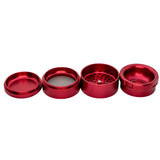 Stache Products Grynder 4pc in Red, 2.5" Diameter, Disassembled View Showing All Parts