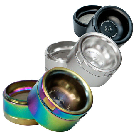 Stache Products Grynder 4pc/2.5" steel grinders in black, silver, and rainbow colors, compact design