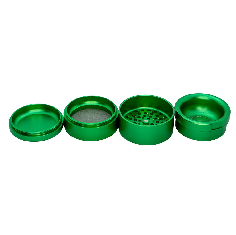 Stache Products Grynder 4pc in vibrant green, 2.5" diameter, portable steel herb grinder, top view