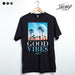 StonerDays Good Vibes Hemp Tee in Caviar Black with Tropical Print, Front View on Hanger