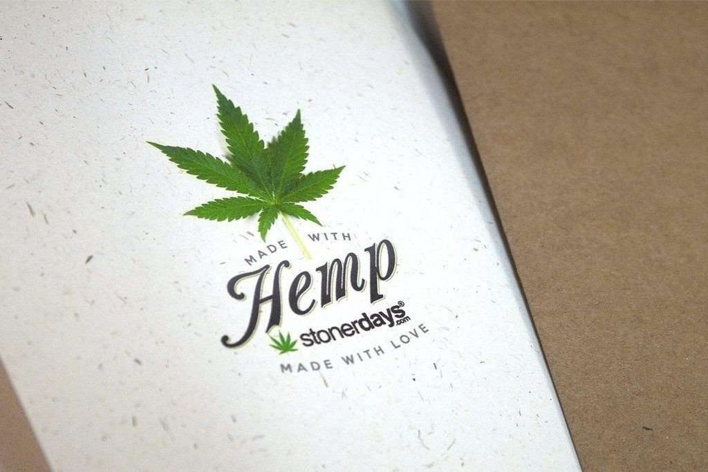 Close-up of StonerDays Happy Holiblaze Hemp Christmas Card with Cannabis Leaf Design