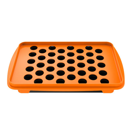 Storz & Bickel orange dosing capsule filling set for vaporizers, top view on white background