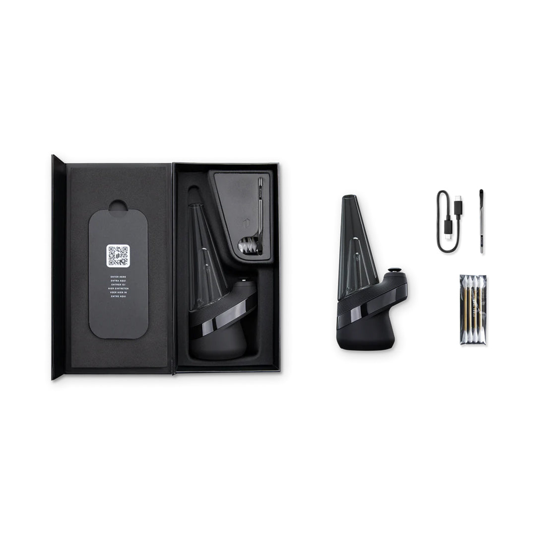 Puffco New Peak Vaporizer and accessories displayed in open box, side view, ideal for on-the-go use