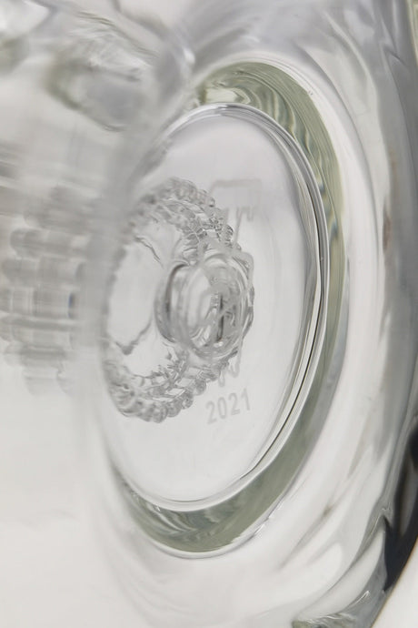 Close-up of TAG Bent Neck Bong's Matrix Diffuser and 2021 engraving, clear borosilicate glass