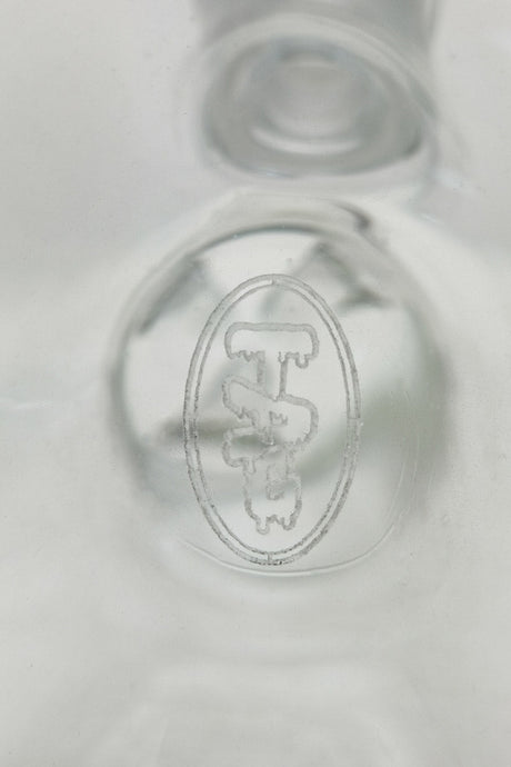 Close-up of TAG logo on 12" Beaker Bong made by Thick Ass Glass, clear quartz quality