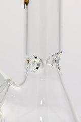 Close-up of TAG 12" Beaker Bong in clear glass, showing 44x4MM thickness and 18/14MM downstem