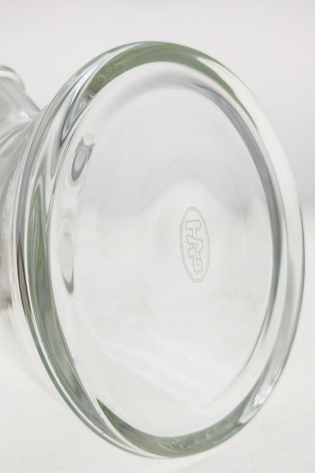 Close-up of TAG 12" Beaker Base showing 50x7MM thickness and embossed logo