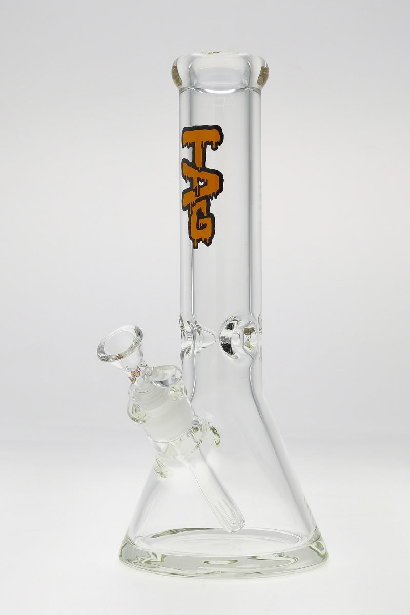 TAG 12" Beaker Bong in Clear Borosilicate Glass with Black Logo, Front View on White Background
