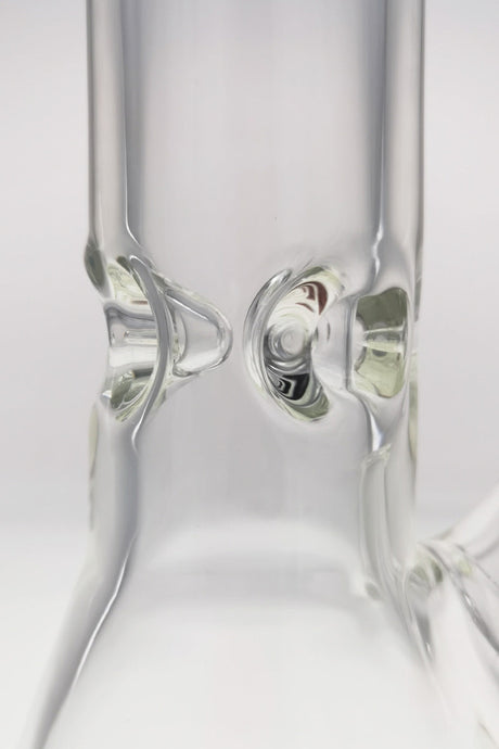 Close-up of TAG 12" Beaker Bong's clear glass 18/14MM downstem on white background