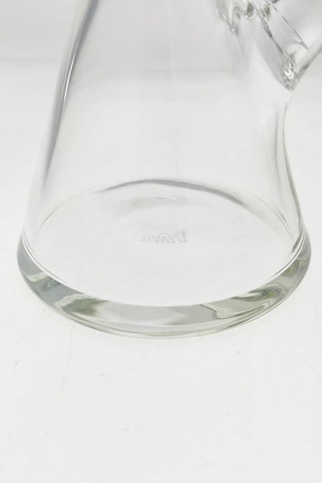 Close-up of TAG 12" Beaker Base showing the 50x9MM thickness and logo detail