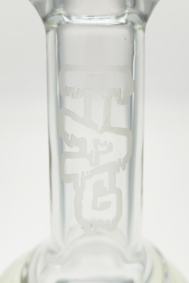Close-up of TAG logo on 12" Bent Neck Bong with Inline Diffuser, Clear Glass, 90 Degree Joint