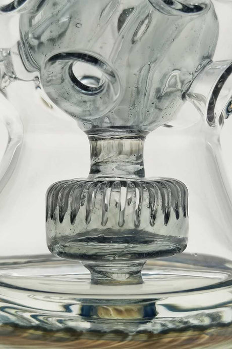 Close-up of TAG 12" Faberge Egg Klein Incycler with intricate percolator design, clear glass, 14MM female joint.