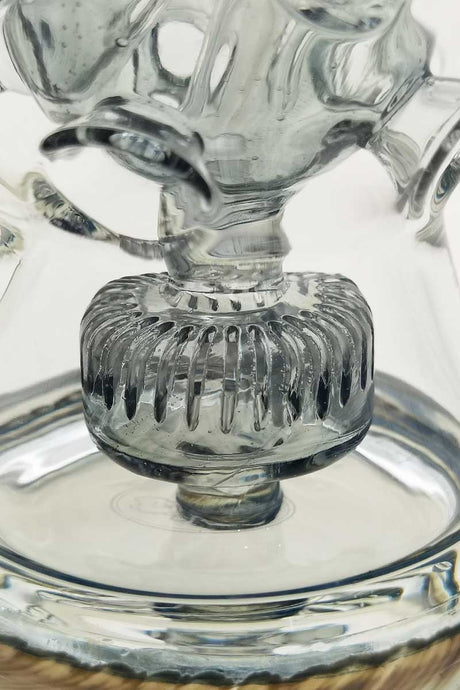 Close-up of TAG 12" Faberge Egg Klein Incycler with intricate percolator design, clear glass, 14MM Female joint