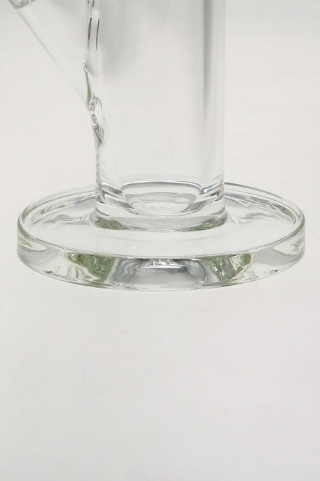 Close-up view of TAG 12" Straight Tube Bong base with Wavy Sandblasted Logo, clear glass, 50mm diameter