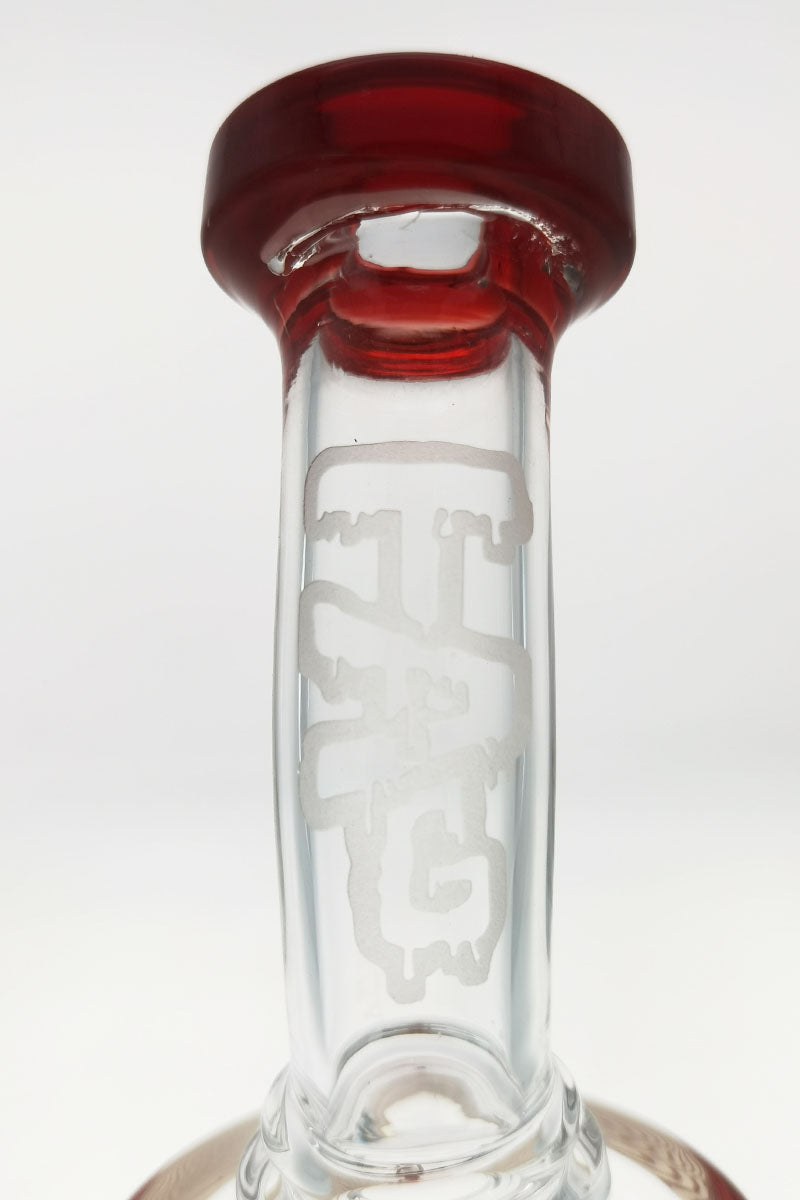 Close-up of TAG 12" Super Slit Bellow UFO Bong neck with frosted logo, 18MM Female joint