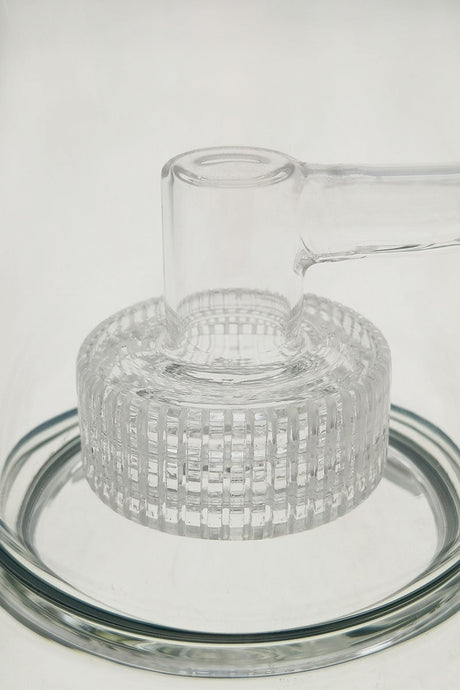 Close-up of TAG Super Slit Matrix Diffuser for bongs, clear borosilicate glass, 18MM female joint