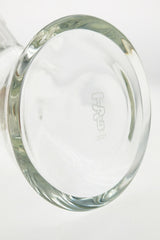 Close-up of TAG 12" Super Slit UFO Beaker bottom with engraved logo, clear high-quality glass