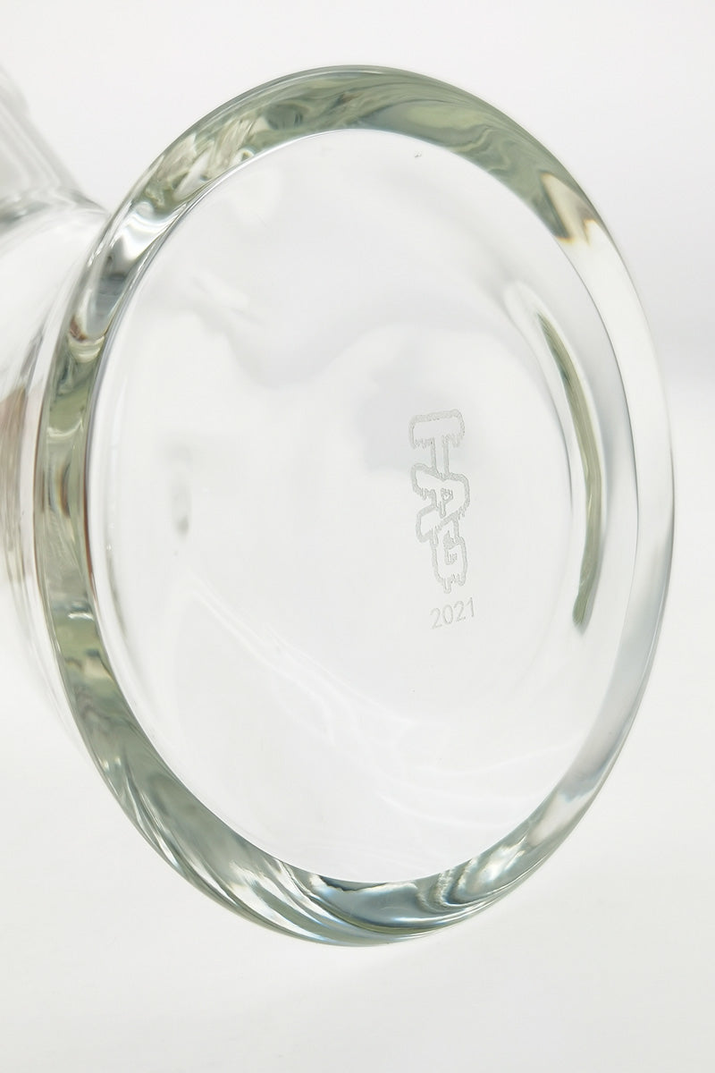 Close-up of TAG 12" Super Slit UFO Beaker base with etched logo, clear glass, 32x4MM