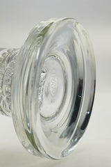 Close-up of TAG 13" Double Ratchet Bubbler's thick base with logo, highlighting 65x5MM glass quality
