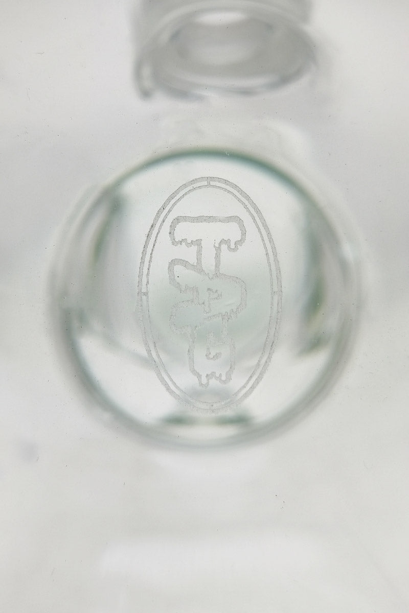 Close-up view of TAG logo on 14" Beaker Bong by Thick Ass Glass, clear glass detail