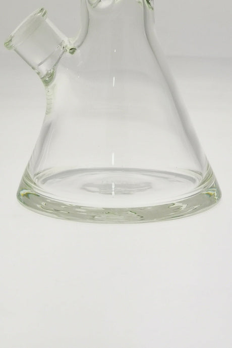 Close-up of TAG 18" Beaker Bong base with 7mm thick glass and Rasta color accents