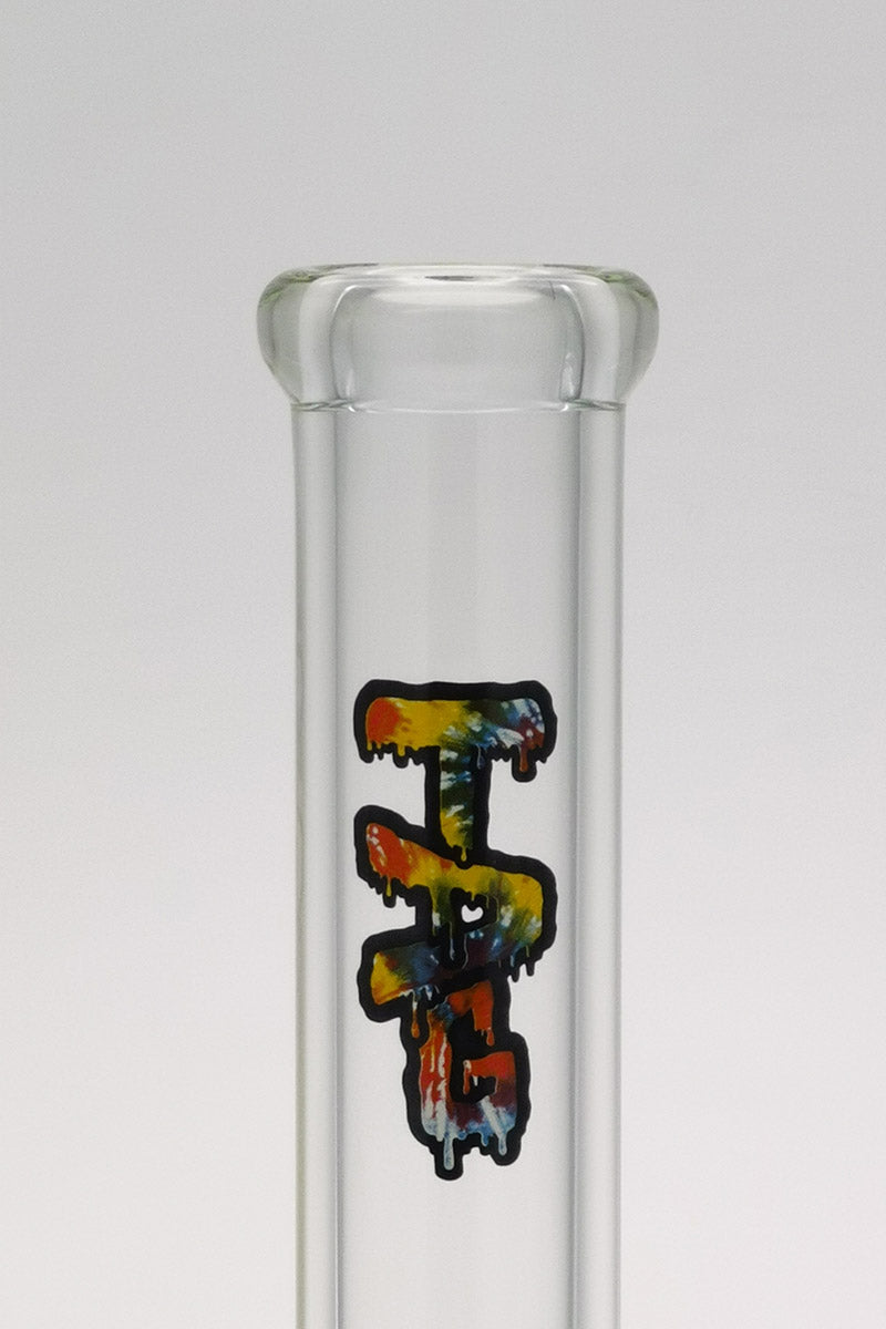 Close-up of TAG 18" Beaker Bong in 9mm thick glass with tie-dye logo, 28/18mm downstem