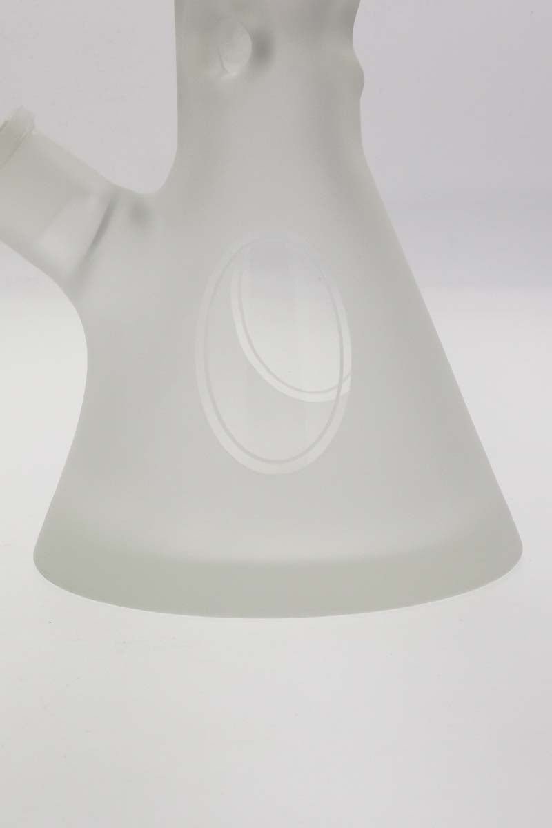 Close-up of TAG 18" Beaker Bong base, 50x9MM thick quartz, Rasta design, on white background