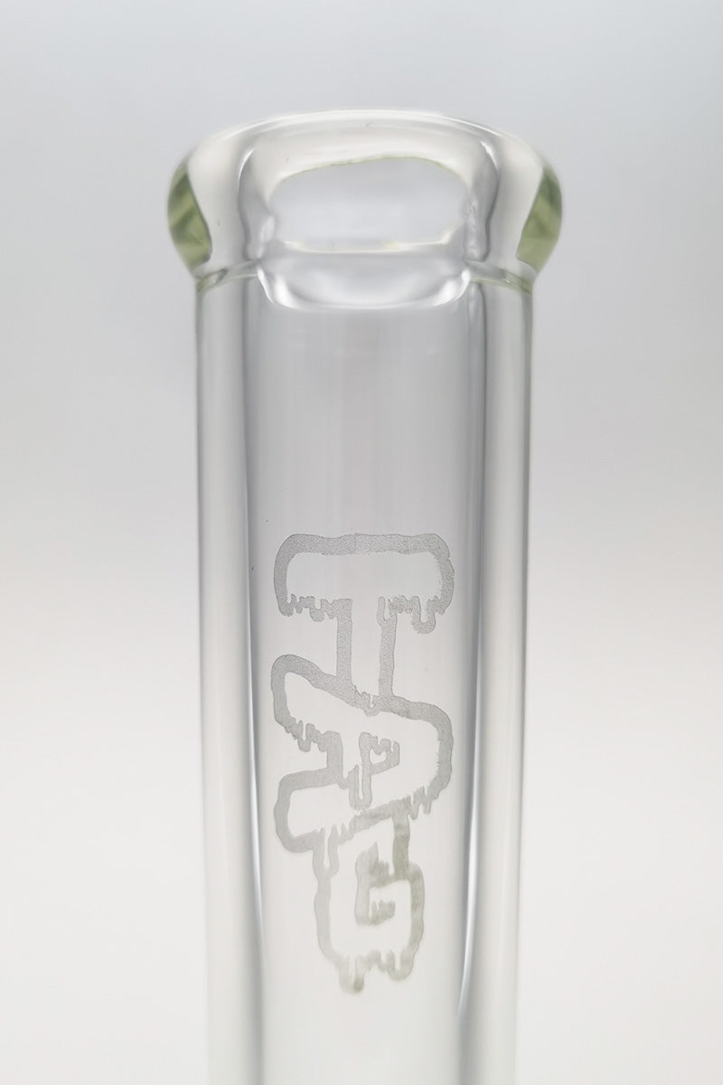 Close-up of TAG 18" Beaker Bong neck with Rasta logo on super thick glass