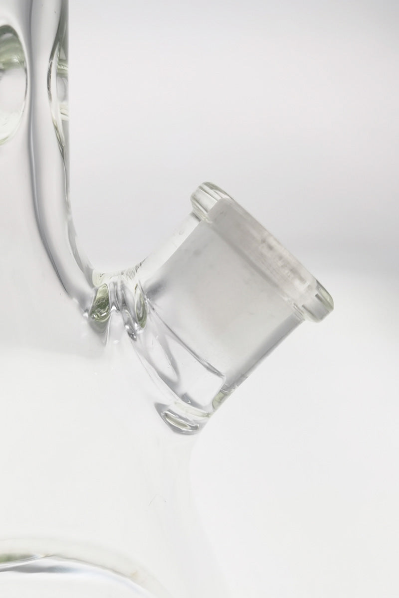 Close-up of TAG 18" Rasta Beaker Bong's 18/14MM downstem, showcasing its super thick 9mm glass