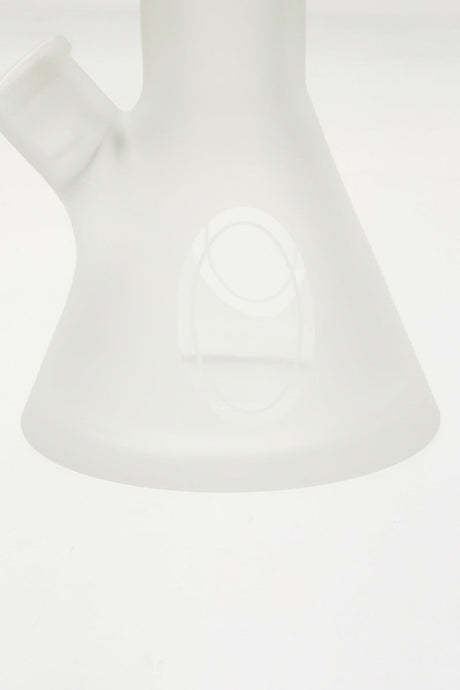 Close-up of TAG 19" Beaker Bong base with Rasta logo, 50x7MM thick glass, white background