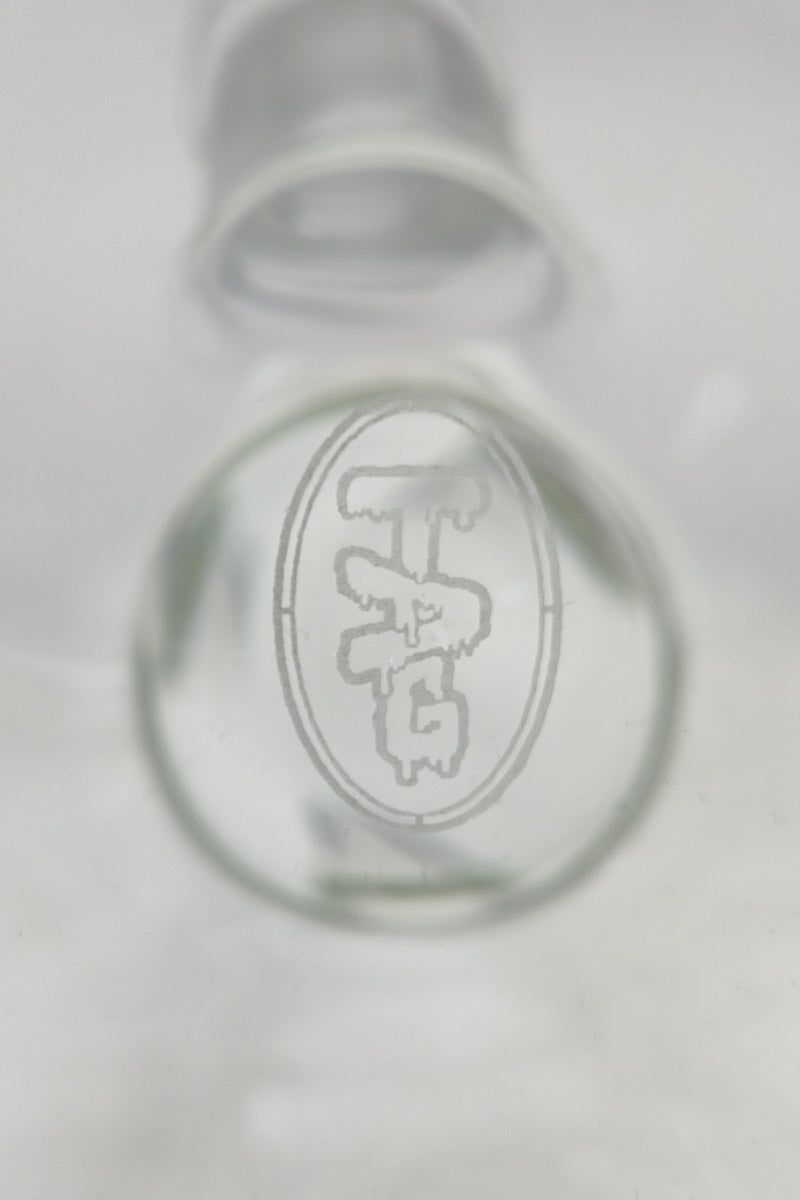 Close-up of TAG 20" Beaker Bong logo on 5mm thick borosilicate glass, clear with sandblasted design.