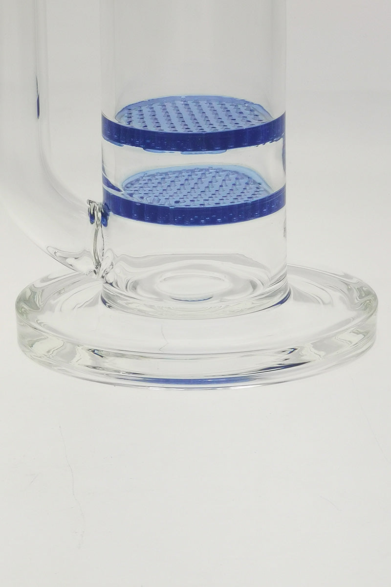 Close-up of TAG bong base with double honeycomb and showerhead percs, light blue accents.