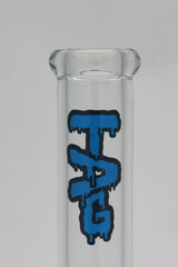 Close-up view of TAG bong neck with wavy blue label on clear glass, 18MM female joint size.