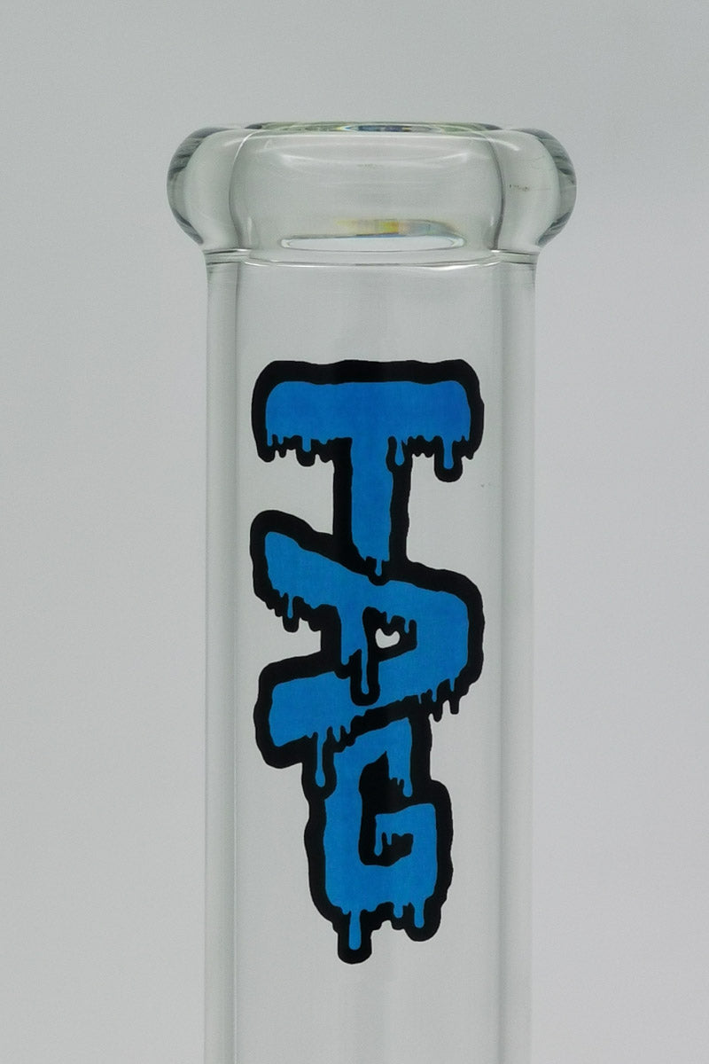 Close-up of TAG bong neck with wavy blue logo, showcasing the thick 7mm glass quality and clear design.