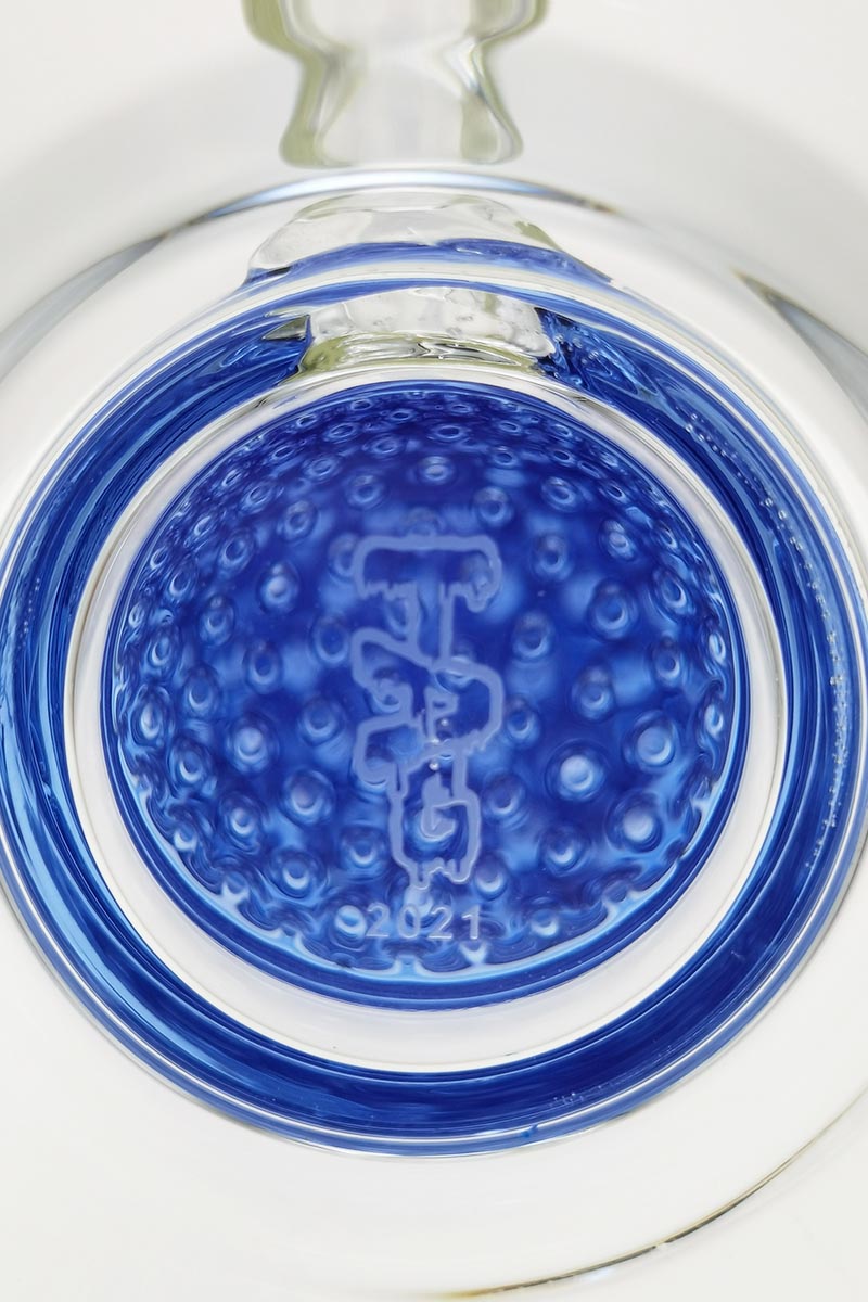 Close-up of TAG 27" Bong base with blue octuple honeycomb percolator and TAG logo