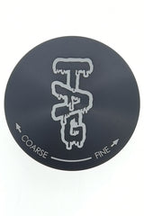 TAG 3" Black Four Chamber Grinder with 120 Micron Mesh and Wavy Engraved Logo - Top View