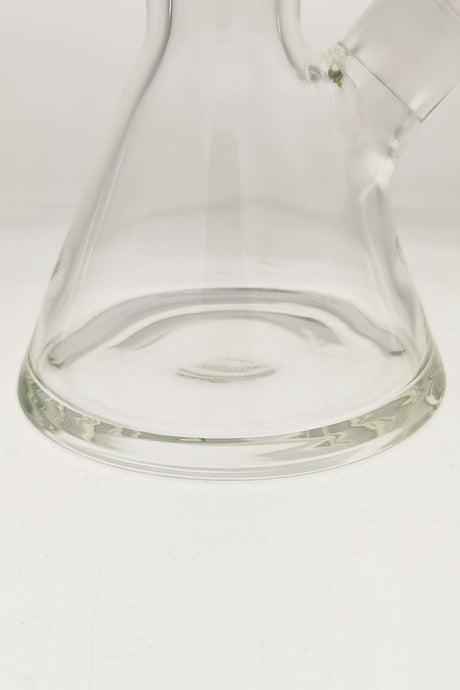 Close-up view of TAG 30" Beaker Bong base with Rasta logo, showcasing its heavy 9mm thick glass